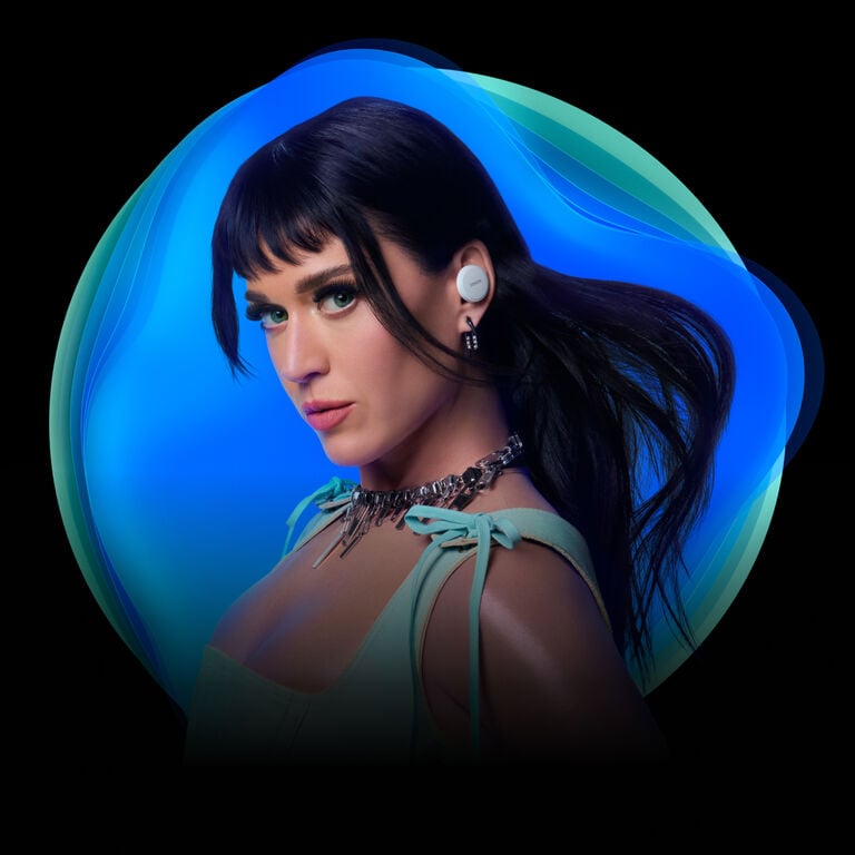 Katy Perry wearing Denon PerL Pro earbuds